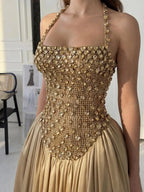 Cocoslly Halter Neck Strapless Sleeveless Long A-Line Prom Dress With Pleated And Sequins Rhinstone | Champage Satin YK0886