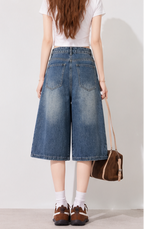 Rhinestone-embellished washed blue high-waisted loose-fitting cropped jeans