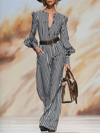 Retro Chic Black And White Striped Puff-Sleeve Belted Wide-Leg Jumpsuit