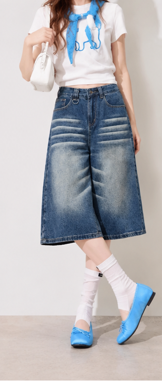 High-waisted wide-leg cropped jeans with a washed gradient effect