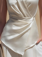 V-Neckline Sleeveless Asymmetric Hem Blouse