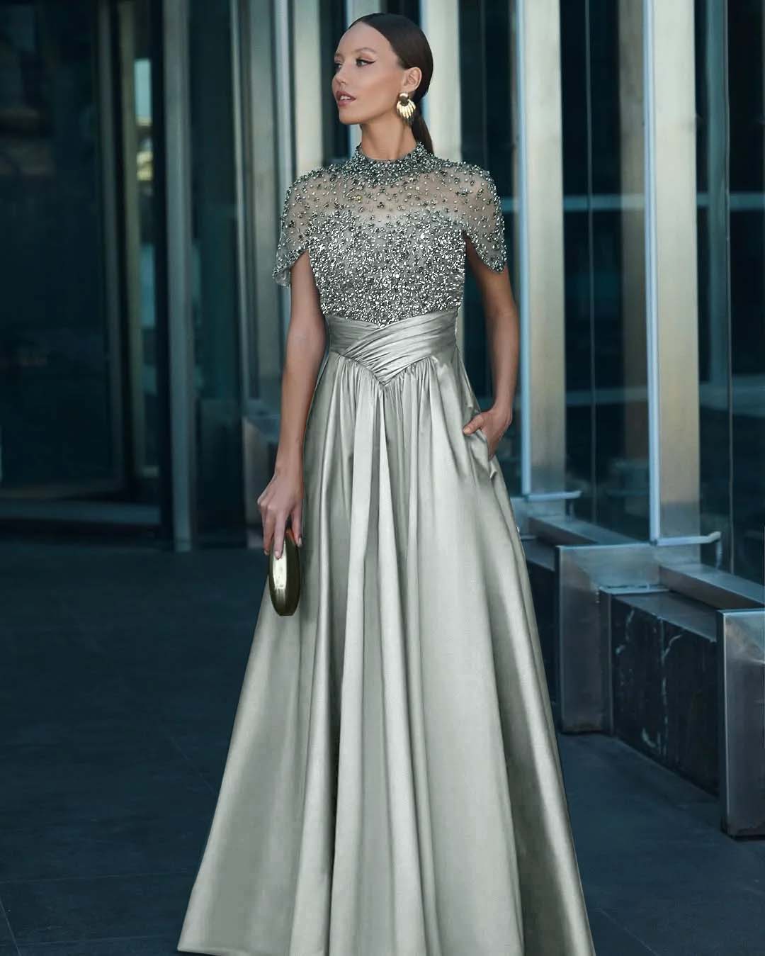 Tulle And Satin High-Neck Short Sleeves Long A-Line Pleated Prom Dress With Pockets And Beadings YK0542