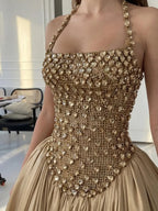 Cocoslly Halter Neck Strapless Sleeveless Long A-Line Prom Dress With Pleated And Sequins Rhinstone | Champage Satin YK0886