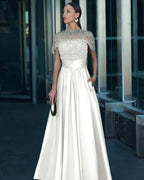 Tulle And Satin High-Neck Short Sleeves Long A-Line Pleated Prom Dress With Pockets And Beadings YK0542