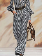 Retro Chic Black And White Striped Puff-Sleeve Belted Wide-Leg Jumpsuit