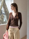 Brown Henley-style long-sleeved top